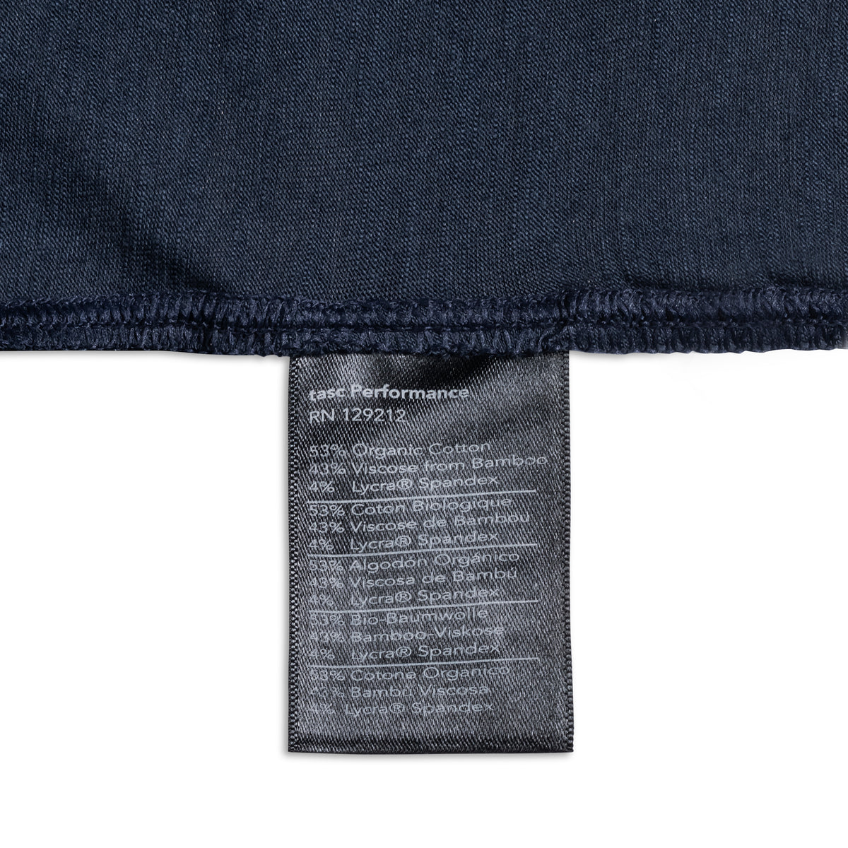 Closeup of tag displaying materials for women's dark blue shirt